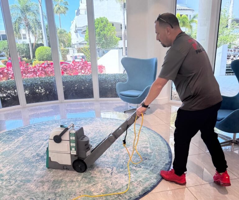 Pro Alliance technician cleaning an office waiting area in Fort Lauderdale